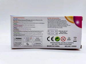 Rear view of Tetris handheld console packaging with English user manual and battery instructions