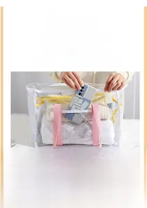 Detail view of a white mesh tote bag with durable pink handles showing storage capacity