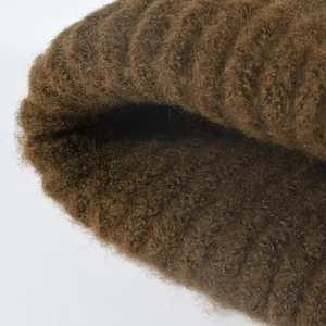 Deep brown thick knit beanie for men and women with warm mohair texture and soft hairy finish