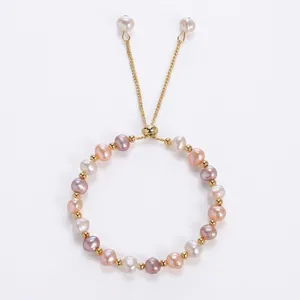 Detail of baroque freshwater pearl bracelet with multi-color beads and adjustable gold clasp