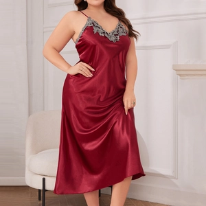 Wine red satin lace lingerie set with V-neck silk nightgown on an elegant chair