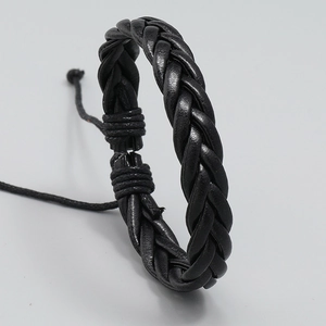 Men's minimalist black woven leather bracelet with adjustable sliding knot closure