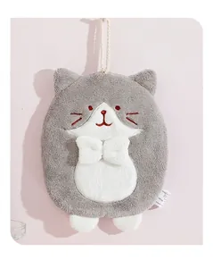 Close-up of a grey and white cat-shaped coral velvet hand towel with hanging loop