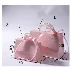 Pink paper gift boxes with pearl handles and ribbons showing S and L size dimensions