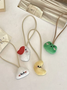 Set of four cute plush animal hair ties with embroidered cartoon faces and elastic cords