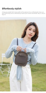 Outdoor lifestyle shot of a mini vintage logo backpack with brown leather detail