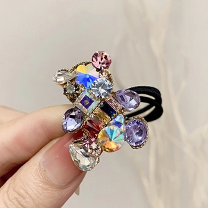 Elastic black hair tie featuring a cute bear charm with colorful crystal rhinestones