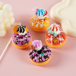 Set of four cute miniature resin donut keychains with artificial cream and pearls
