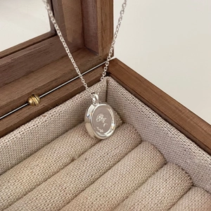 S925 sterling silver oval pendant necklace featuring floral engraving and fine chain