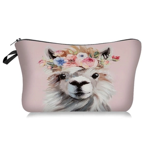 Detail of cute llama print with flower crown on pink portable makeup cosmetic bag
