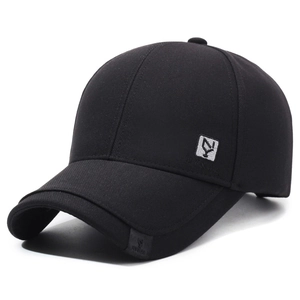Classic black cotton baseball cap with embroidered logo patch and curved brim in side view