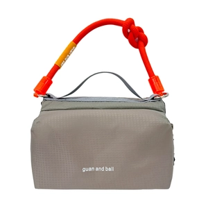 Waterproof outdoor crossbody water bottle bag in grey nylon with orange climbing rope handle