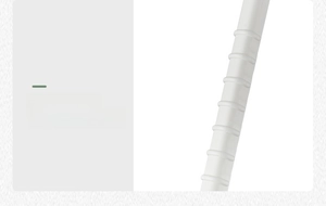 Detail of ergonomic white handle with anti-slip texture for radiator cleaning brush