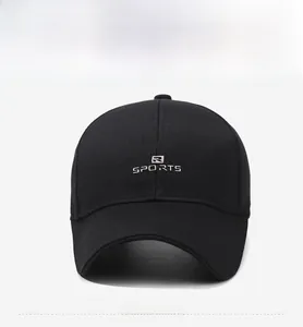 Detail of black baseball cap with SPORTS embroidery and classic six-panel construction