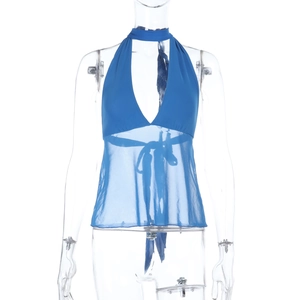 Detail of navy blue halter neck top featuring sheer mesh hem and adjustable ties