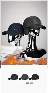 Winter quilted baseball cap with ear flaps featuring diamond patterns and metal logo
