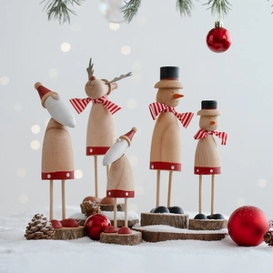 Wooden Christmas figures set including Santa and reindeer on wood base for holiday decor