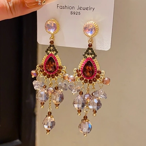 Close-up of vintage waterdrop earrings with zircon crystals and S925 silver needles