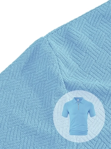 Detailed macro view of light blue knit texture and half-zip collar on men's polo shirt