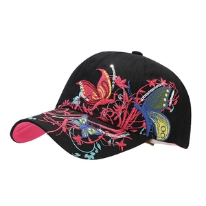 Women's black baseball cap with sequined butterfly and floral embroidery at 45-degree angle