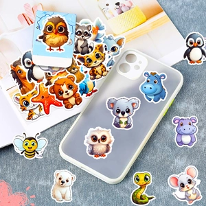 Cute cartoon animal stickers pack displayed on a transparent phone case and light blue fabric