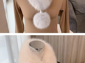 Close-up of fluffy faux fur texture and pom-pom detail on white Hanfu style winter scarf