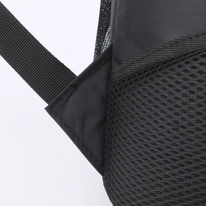 Detail of reinforced nylon shoulder straps and breathable honeycomb mesh padding on backpack