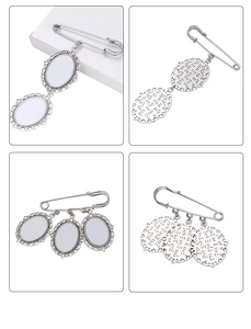 Detailed macro view of silver brooch with lace pendants and oval photo frames for DIY