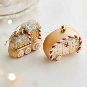 Champagne gold Christmas ornament set featuring festive train and trailer glitter pendants