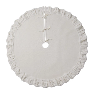 Knitted Christmas tree skirt in cream white with wavy edges and ties for holiday decor