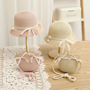 Kids straw hat and matching bow purse set in soft pink and beige for summer sun protection