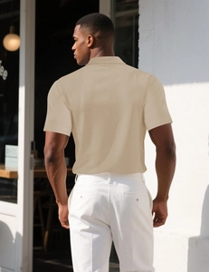 Rear view of khaki short-sleeve polo shirt showing fine knit texture and fit on a model