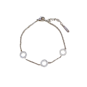 Polished titanium steel chain bracelet featuring three crystal-encrusted rings