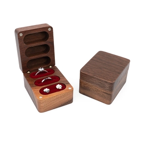 Black walnut wood wedding ring box with three slots and red velvet lining detail