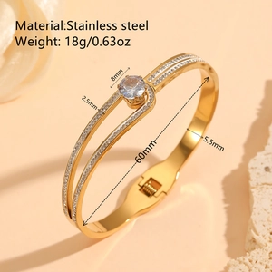 Bracelet jonc doré en acier inoxydable ajouré géométrique serti de zircons ronds