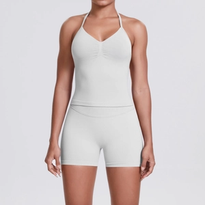 Detail of ribbed gray yoga set featuring V-neck halter top and high-waisted shorts