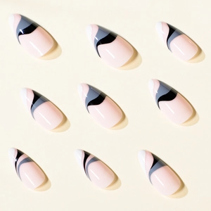Almond press on nails with ink wave patterns and nude pink base for modern manicure