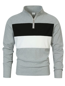 Détail d'un sweat à quart de zip avec design tricolore gris, noir et blanc élégant