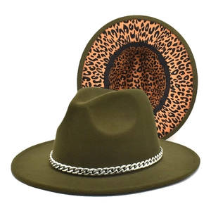 Detail showing olive green fedora with metal chain and leopard print lining