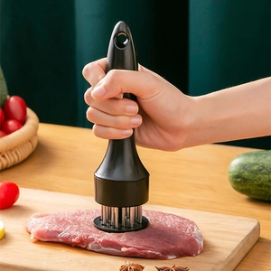 Manual stainless steel meat tenderizer with ergonomic black handle for steaks and chops