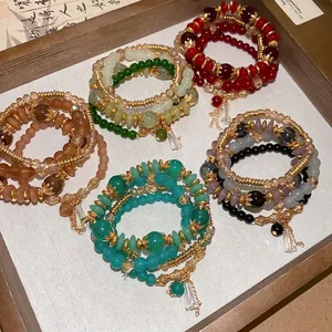 Five sets of multi-layered crystal beaded bracelets in retro Chinese ethnic style