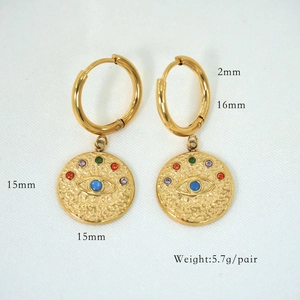 Detail of gold evil eye hoop earrings with colorful crystals and size measurements