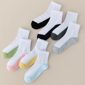 Breathable cotton crew socks for kids with colorful contrast heel and toe in a 7-pair set