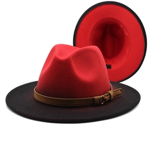 Classic two-tone red and black fedora hat with wide brim and brown faux leather belt