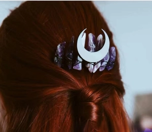 Detail of bohemian silver moon hair comb with raw purple amethyst crystal wire-wrapped