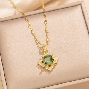 Elegant gold necklace with a square green gemstone pendant surrounded by micro-zirconia stones