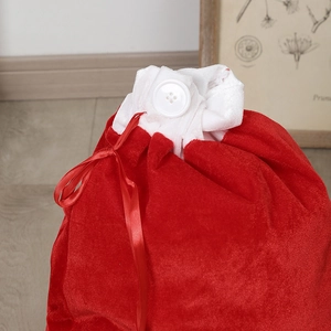 Large red velvet Christmas gift bag with white drawstring and decorative buttons