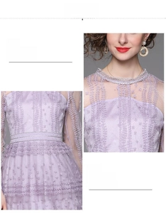 Close-up of the elegant purple lace embroidery and round neckline detail on the dress