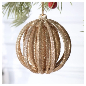 Champagne gold glitter hollow lantern Christmas ball ornament hanging on a pine branch