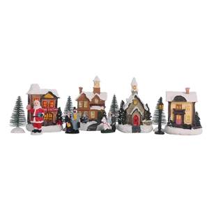 Detailed Christmas miniature village set featuring fire station house and resin figurines